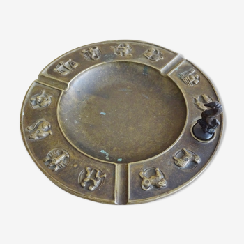 Luxa brass ashtray with zodiac relief and embers killer