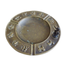Luxa brass ashtray with zodiac relief and embers killer
