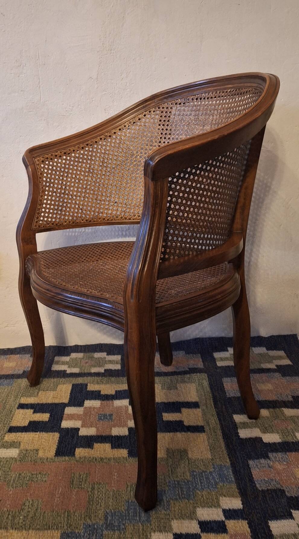 Half-moon rattan and hardwood armchair, early 20th century