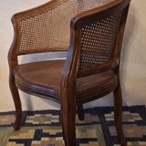 Half-moon rattan and hardwood armchair, early 20th century
