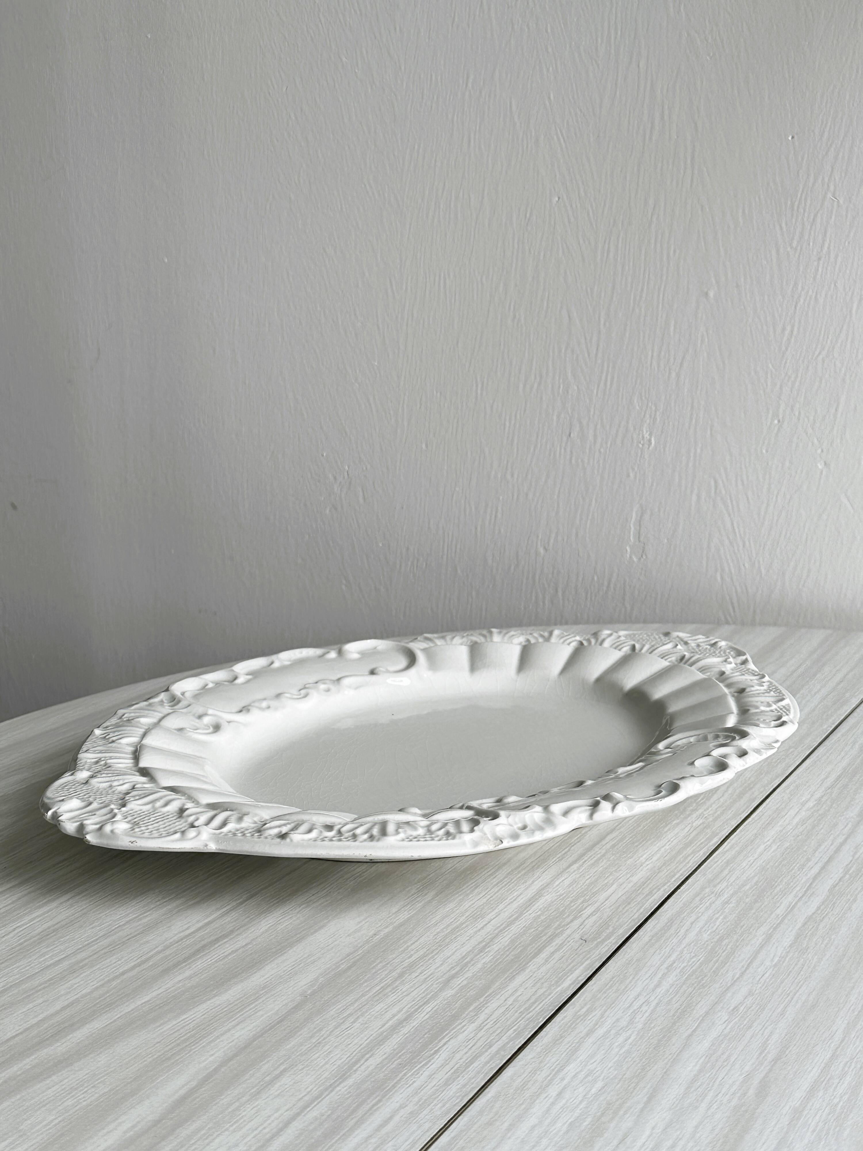Antique white ceramic dish, made in Italy.