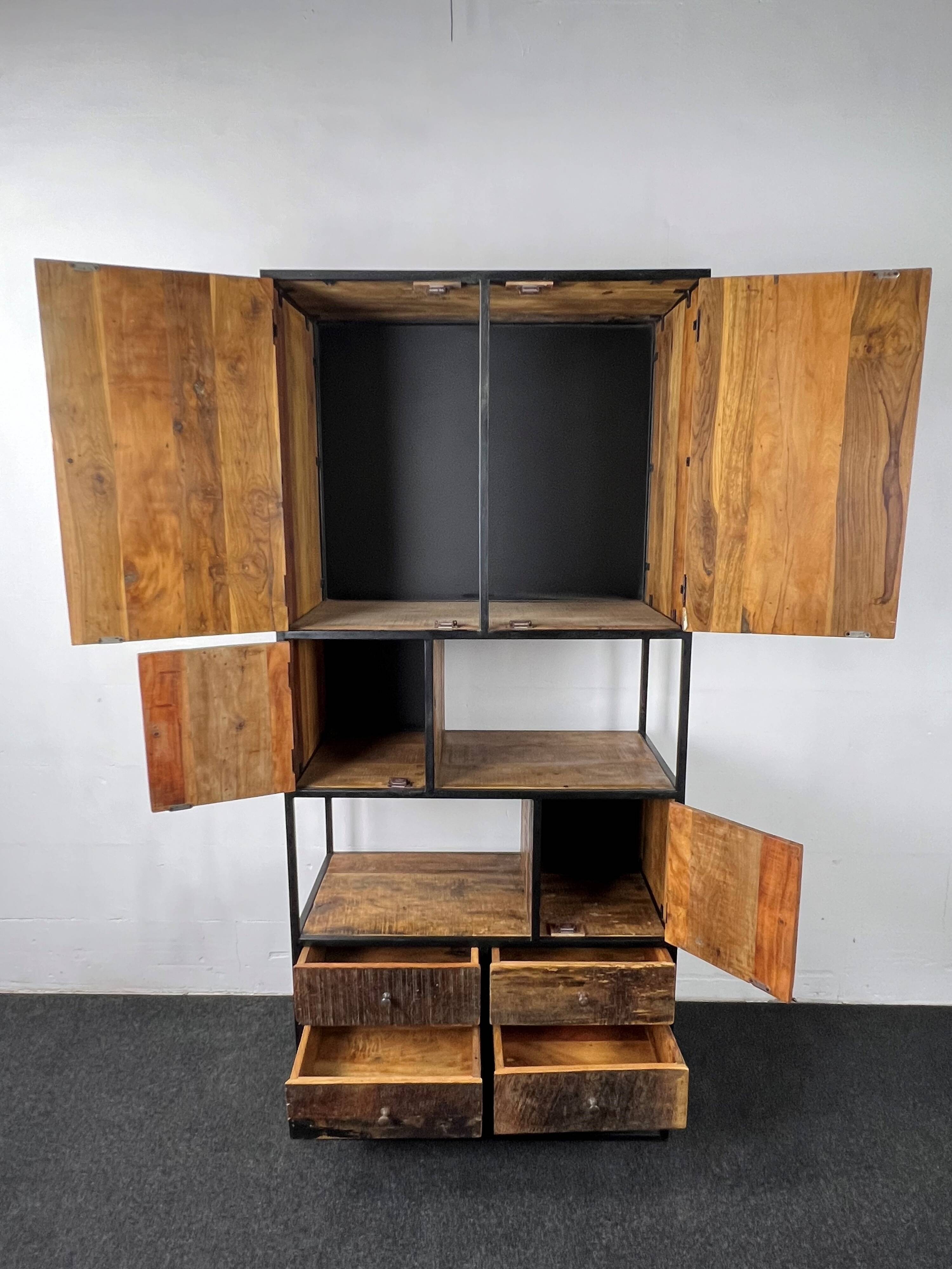 Antique wooden cabinet with black metal structure