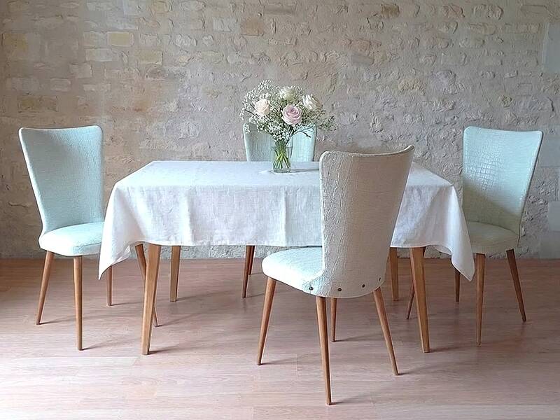 4 vintage Baumann Essor chairs in wood and skai from the 1960s.
