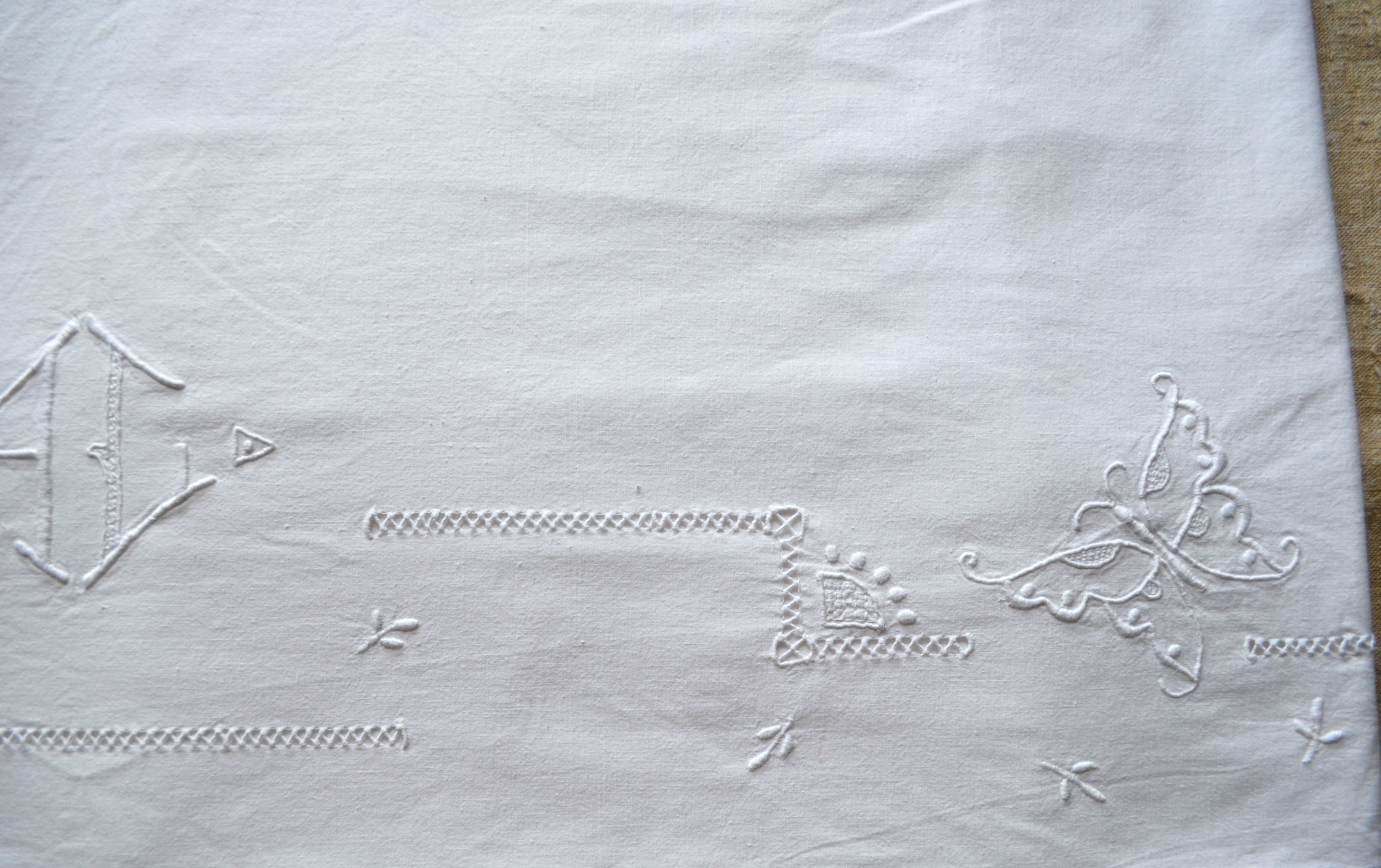 Old sheet hand embroidery and monogram