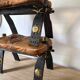 Pair of low Egyptian stools, camel saddles in wood, leather and brass