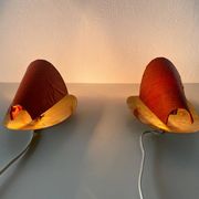 Pair of orange plexiglass and curved brass wall lights, 1950s, Germany