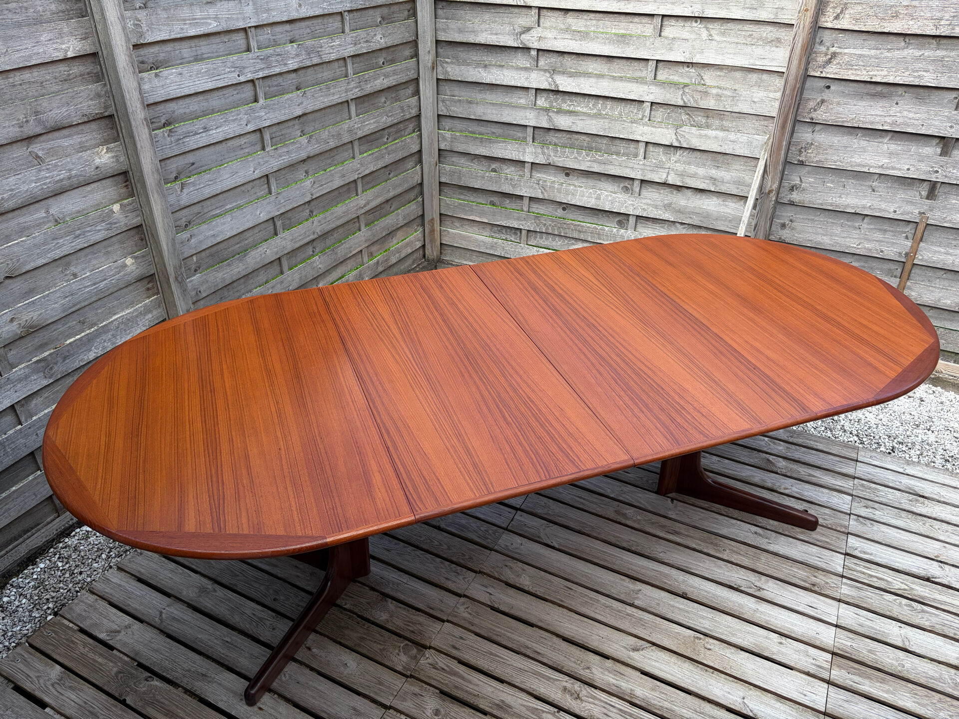 Oval teak table extendable with two leaves, Baumann style.