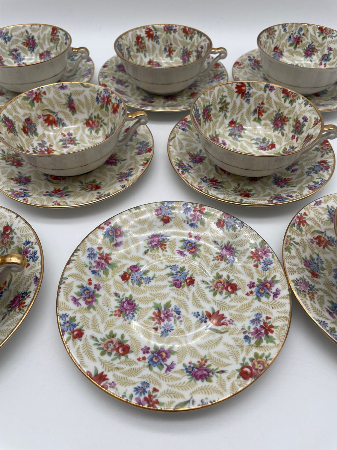Set of 8 Limoges porcelain coffee cups from France with floral and gold pattern