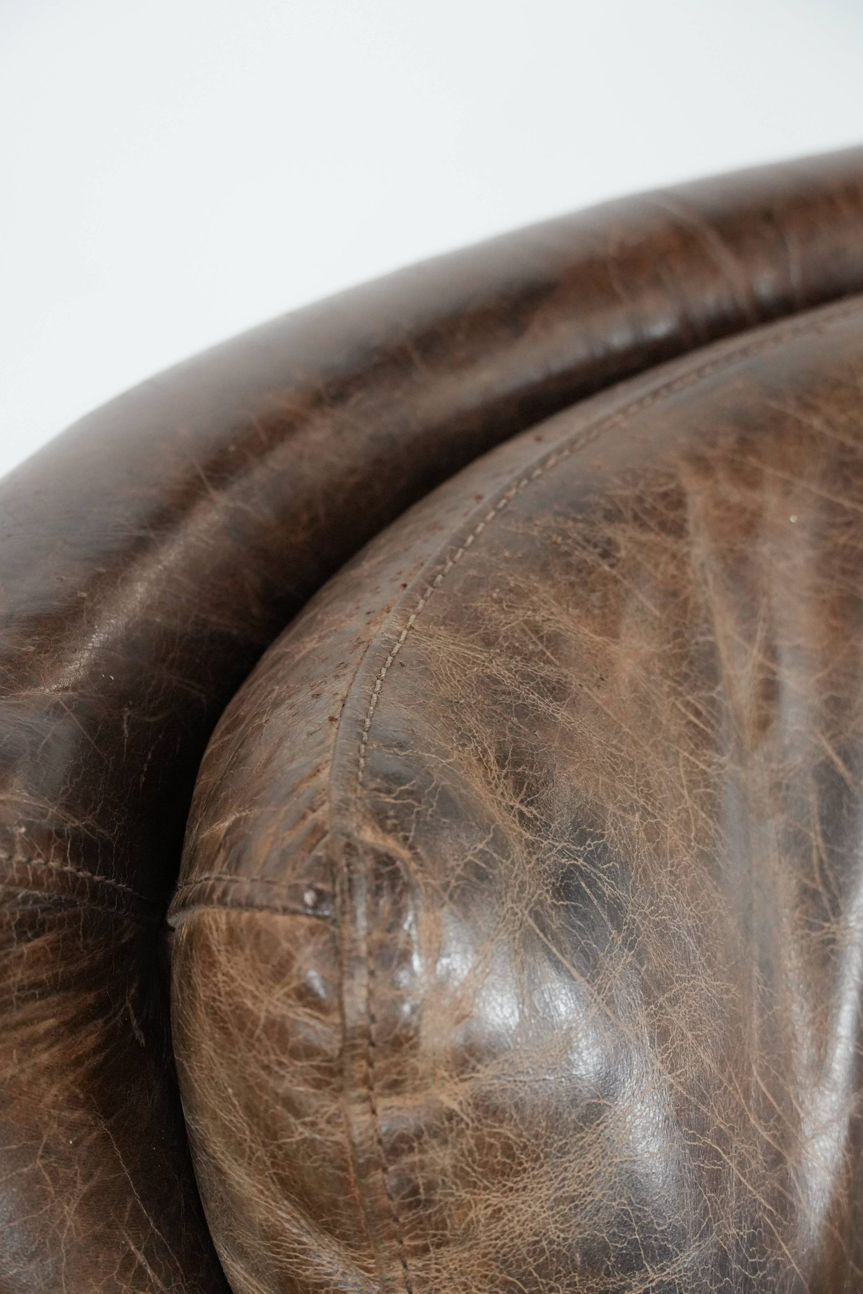 Very comfortable vintage cow leather armchair with beautiful colours