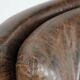 Very comfortable vintage cow leather armchair with beautiful colours