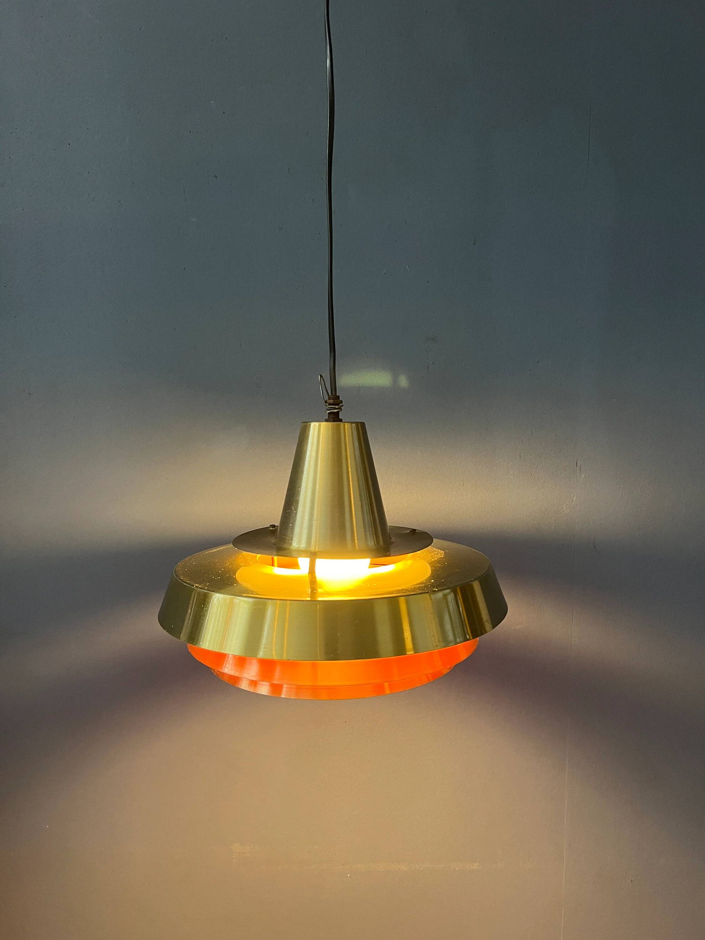 Mid-century Danish style orange brass suspension light.