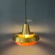Mid-century Danish style orange brass suspension light.