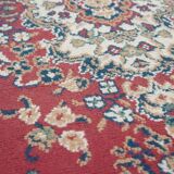 Vintage oriental rug with predominantly red, cream, and beige colors, measuring 168x120 cm