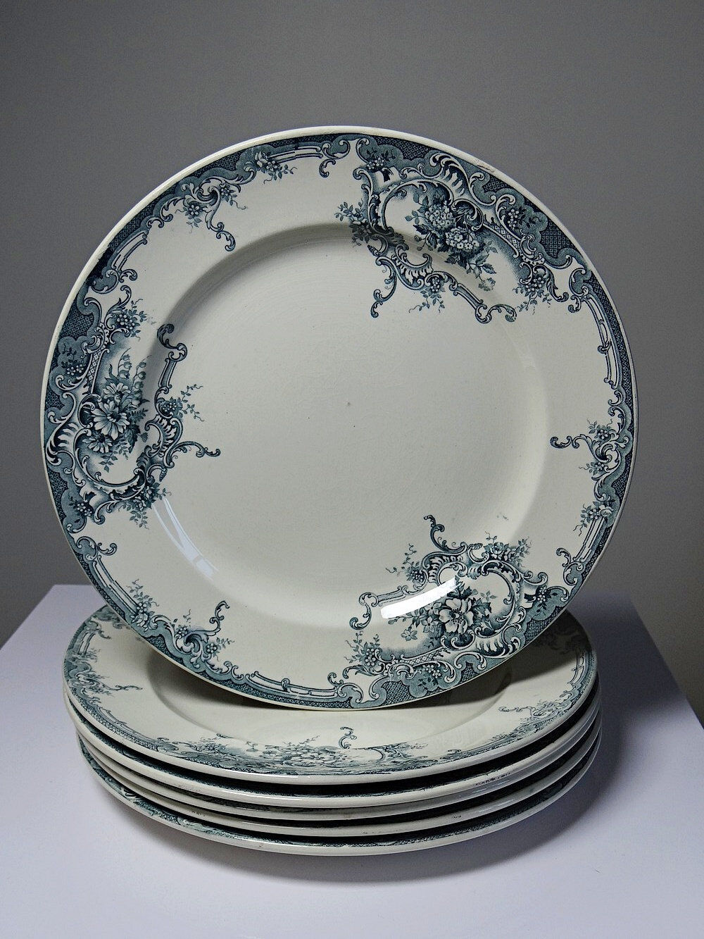 6 antique Boch Frères Keramis plates, Dauphin model, blue decoration, 19th-20th century.