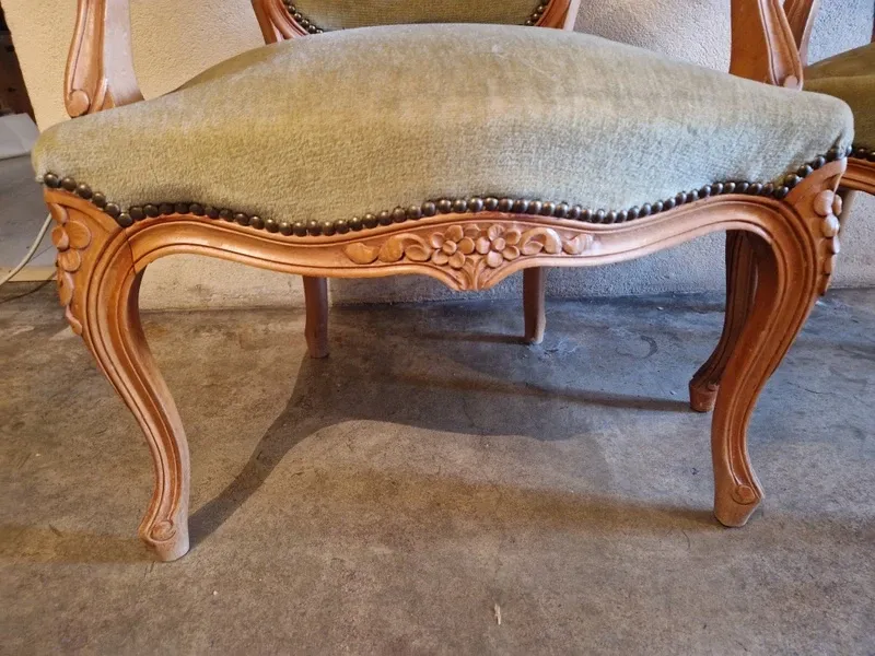 Pair of Louis XV style armchairs in cherry wood, upholstered in green velvet.