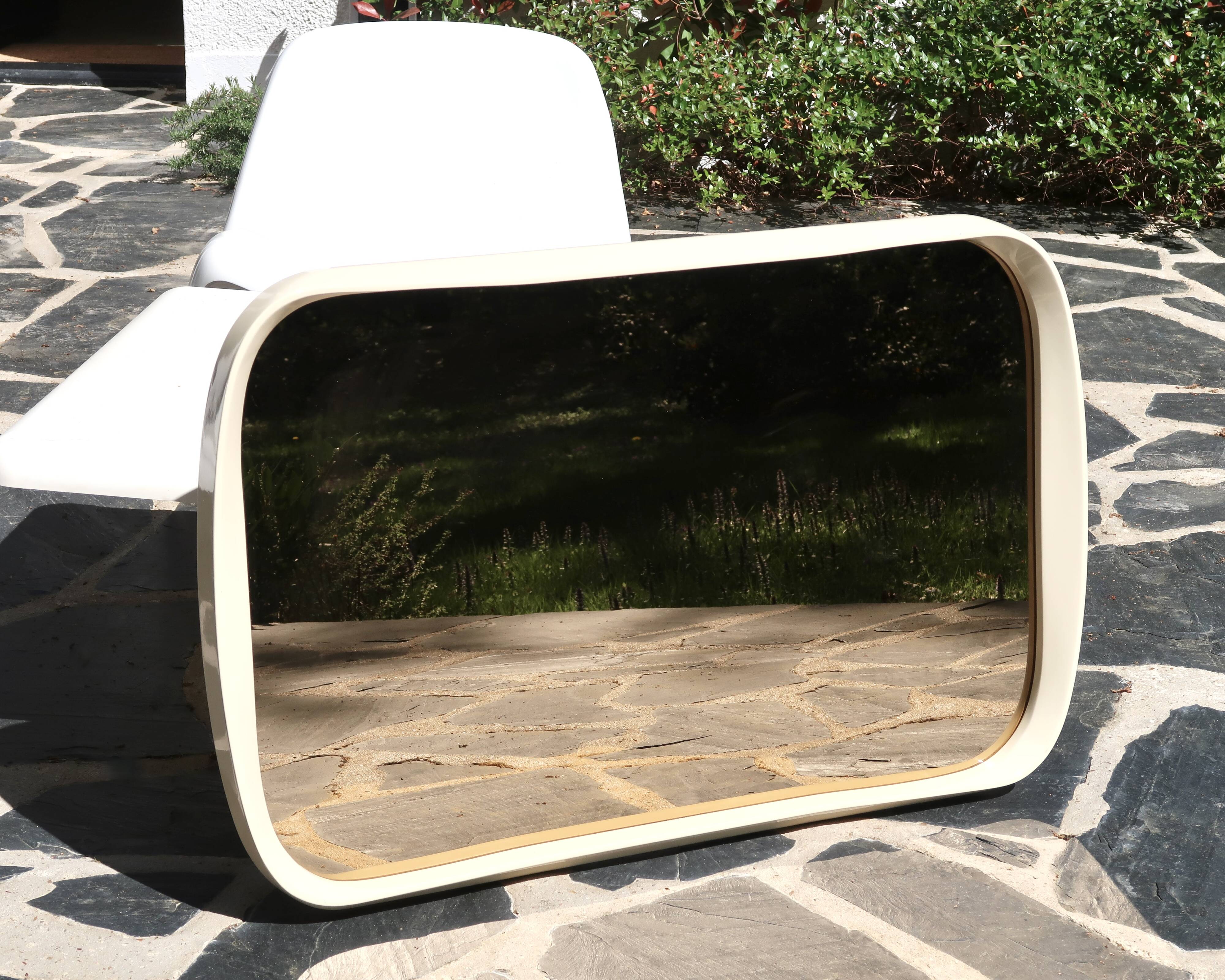 Rectangular mirror, horizontal or vertical, in white lacquered wood, 1970s.