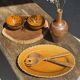 Pair of small orange bowls with black edging