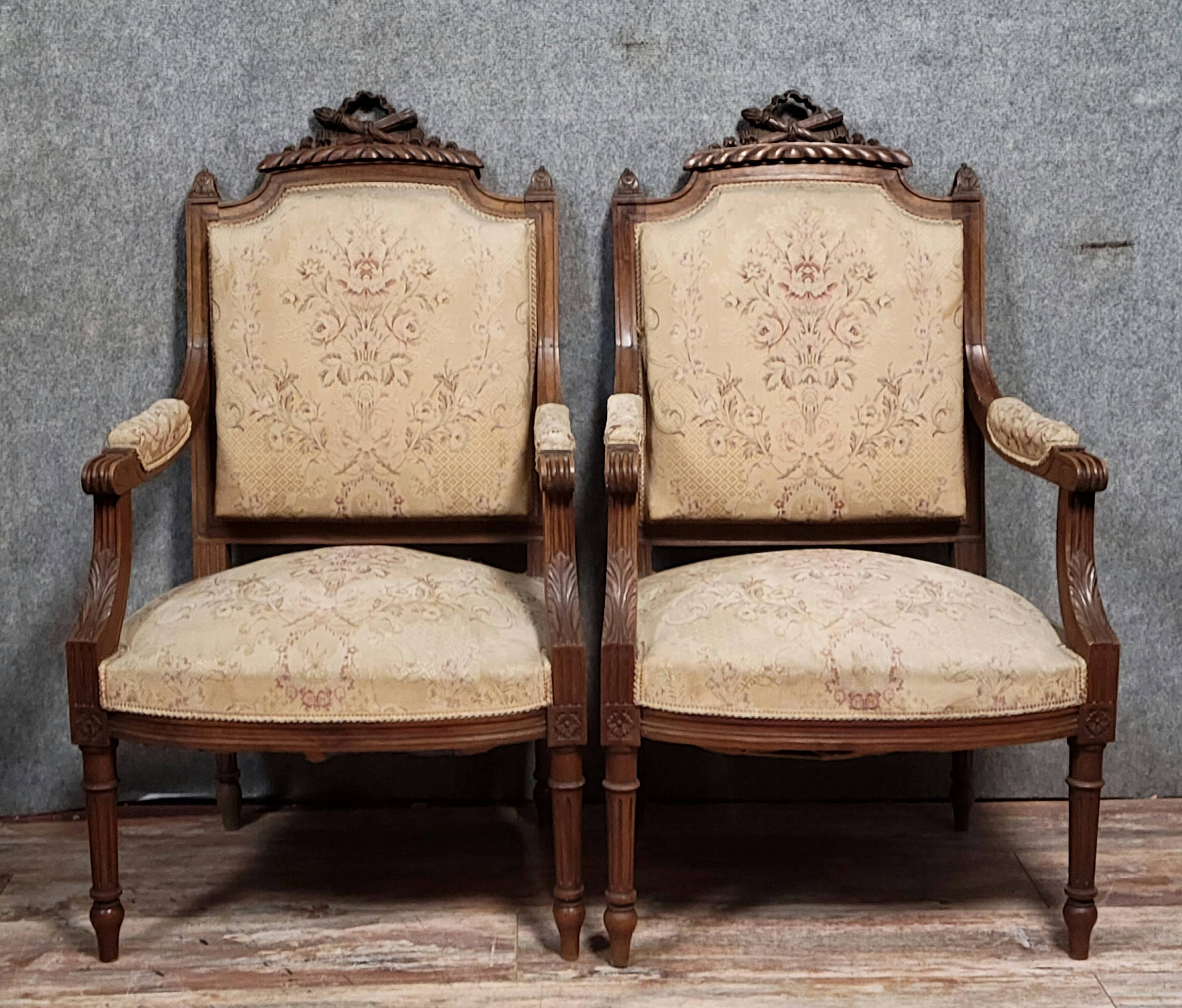 Pair of finely carved armchairs in the Louis XVI style