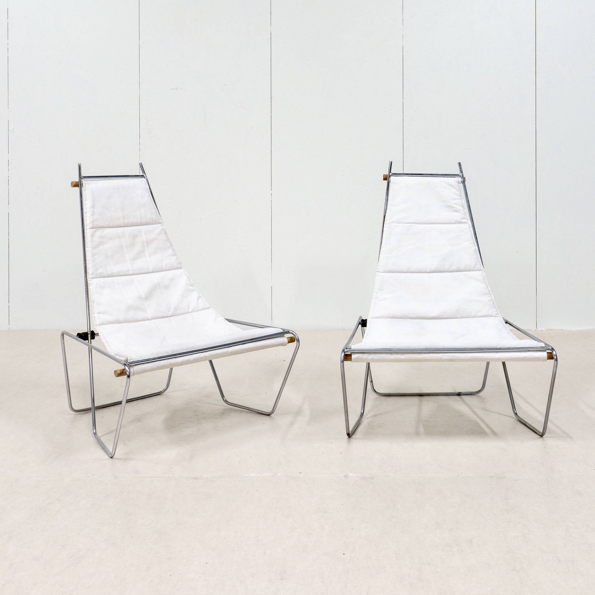 A pair of low chairs. France 70s