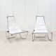 A pair of low chairs. France 70s
