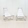 A pair of low chairs. France 70s