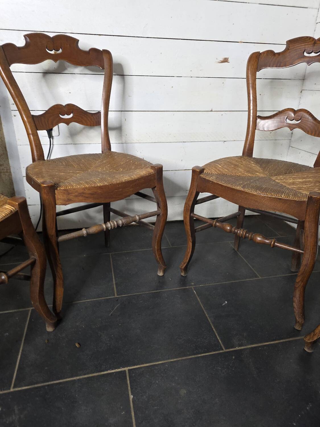 4 old straw chairs
