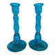 Pair of molded pressed blue glass candle holders
