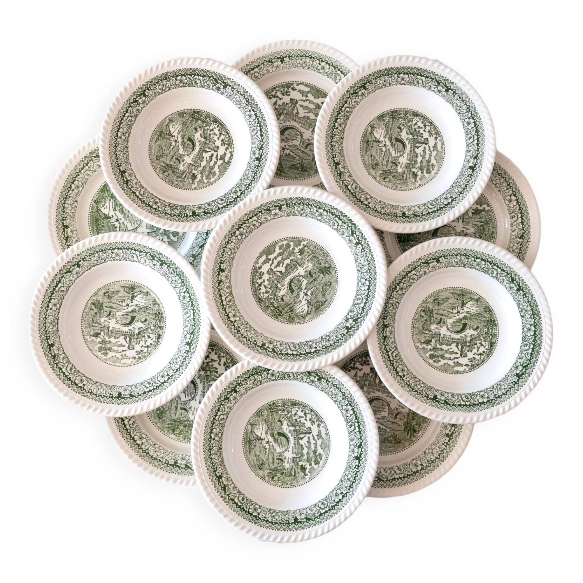 Service of vintage green plates in country English earthenware