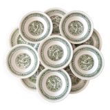 Service of vintage green plates in country English earthenware