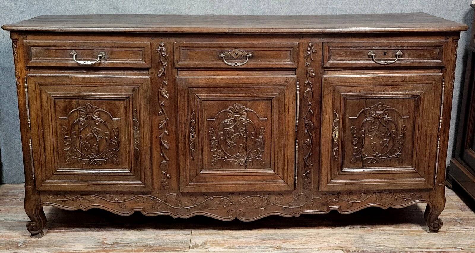 Important Louis XV period sideboard in carved solid oak