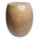 Brutalist monoxyle stool in solid mango wood with an organic shape.