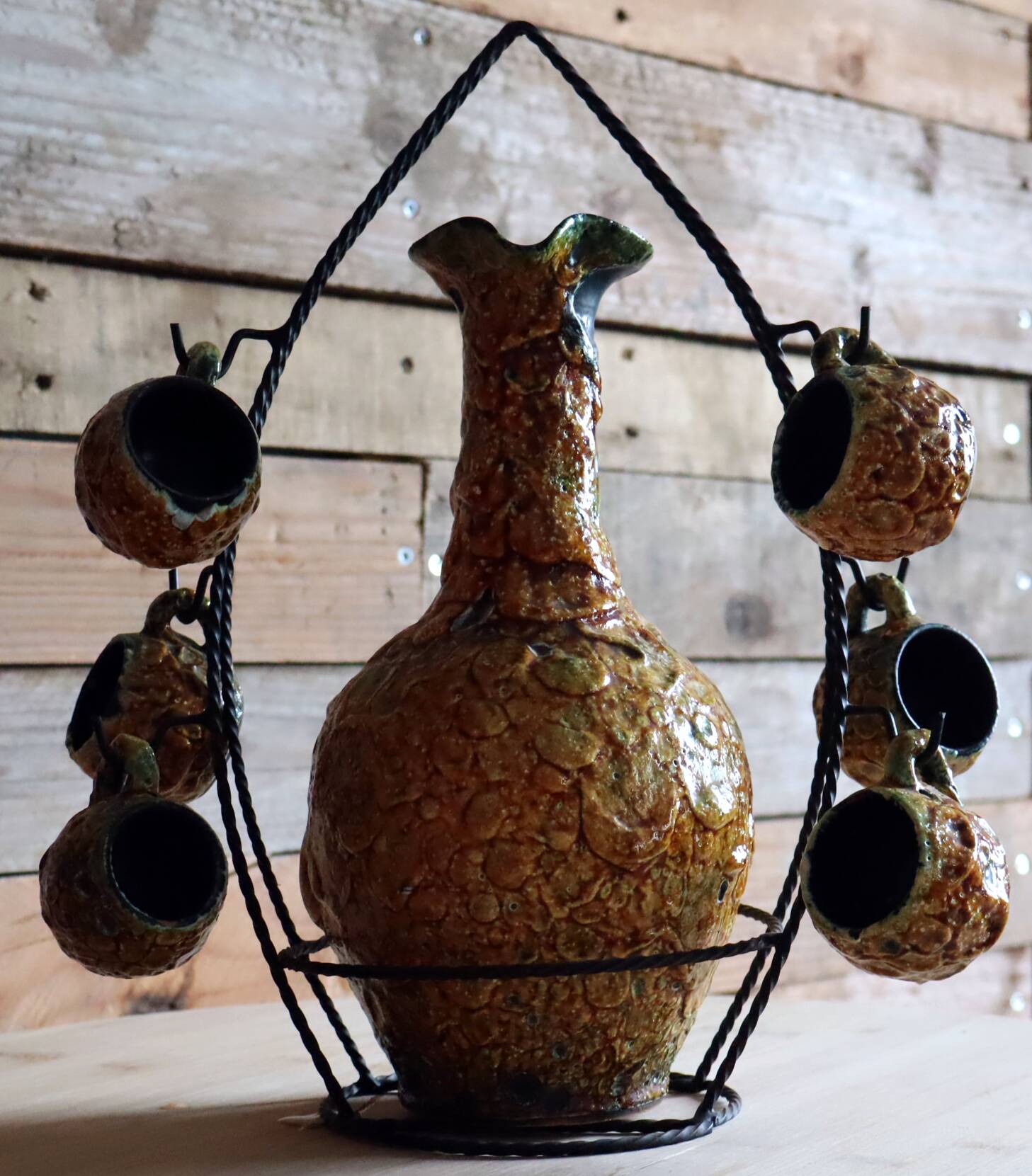Vintage ceramic liqueur service "Fat Lava" and wrought iron
