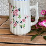 Small pitcher in iron earth with double old decoration