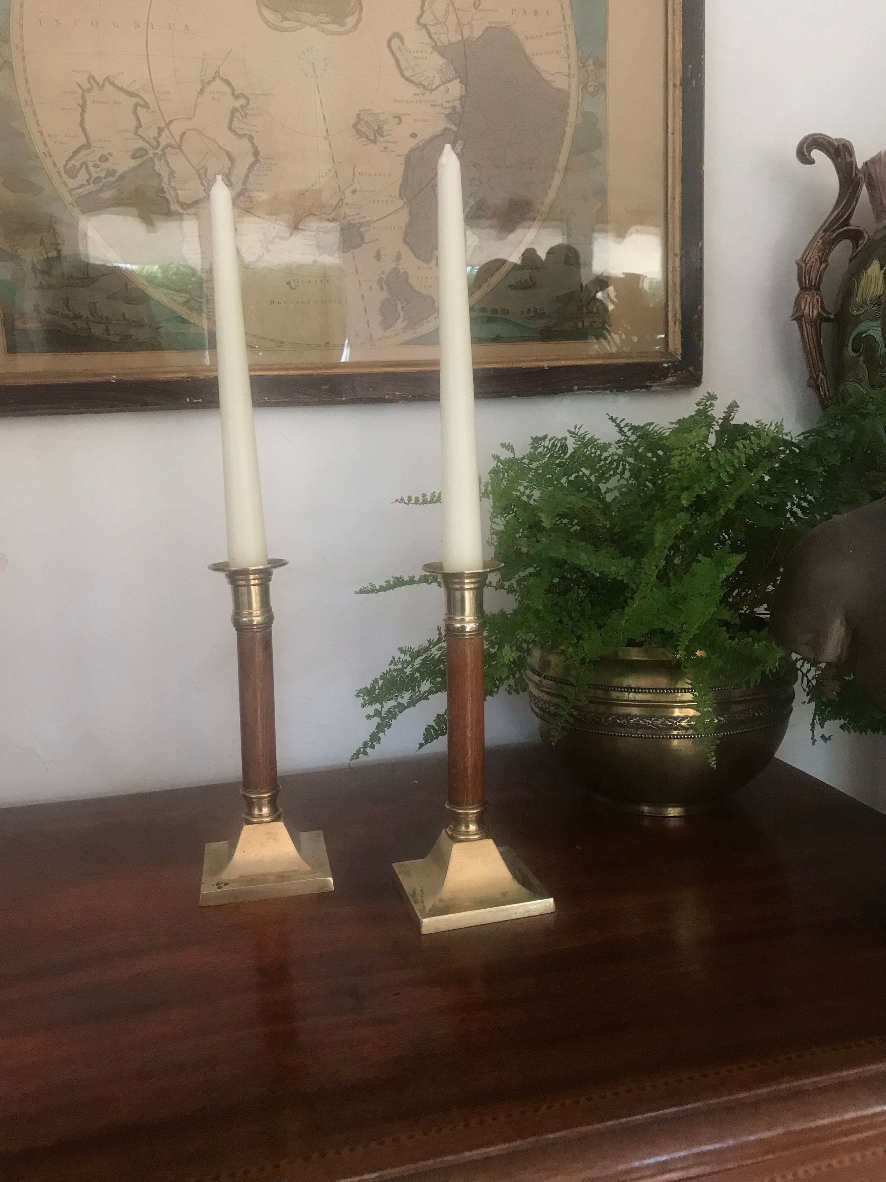 Pair of wood and brass candle holders