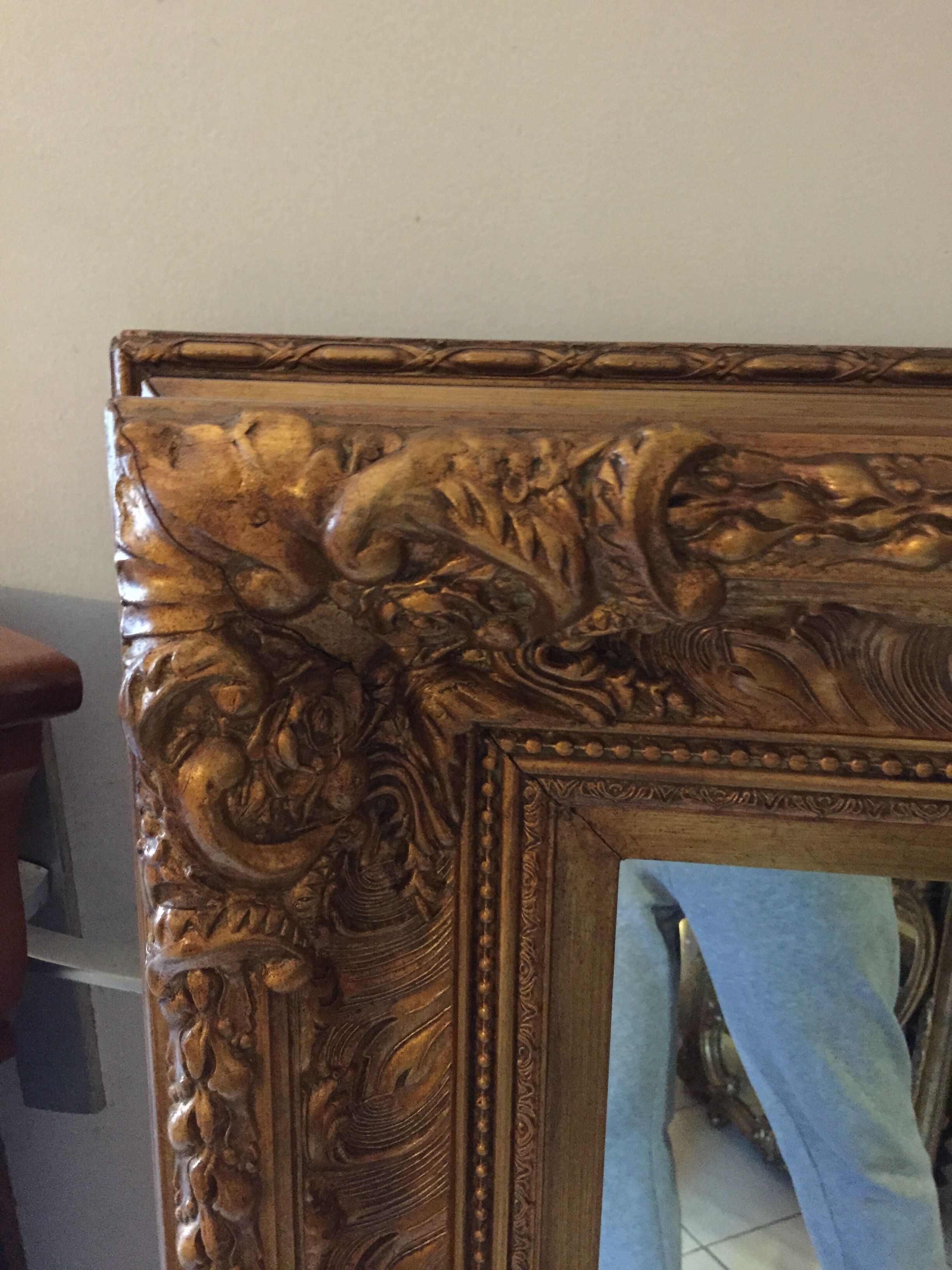 Miroir en bois doré 125 x 95 cm