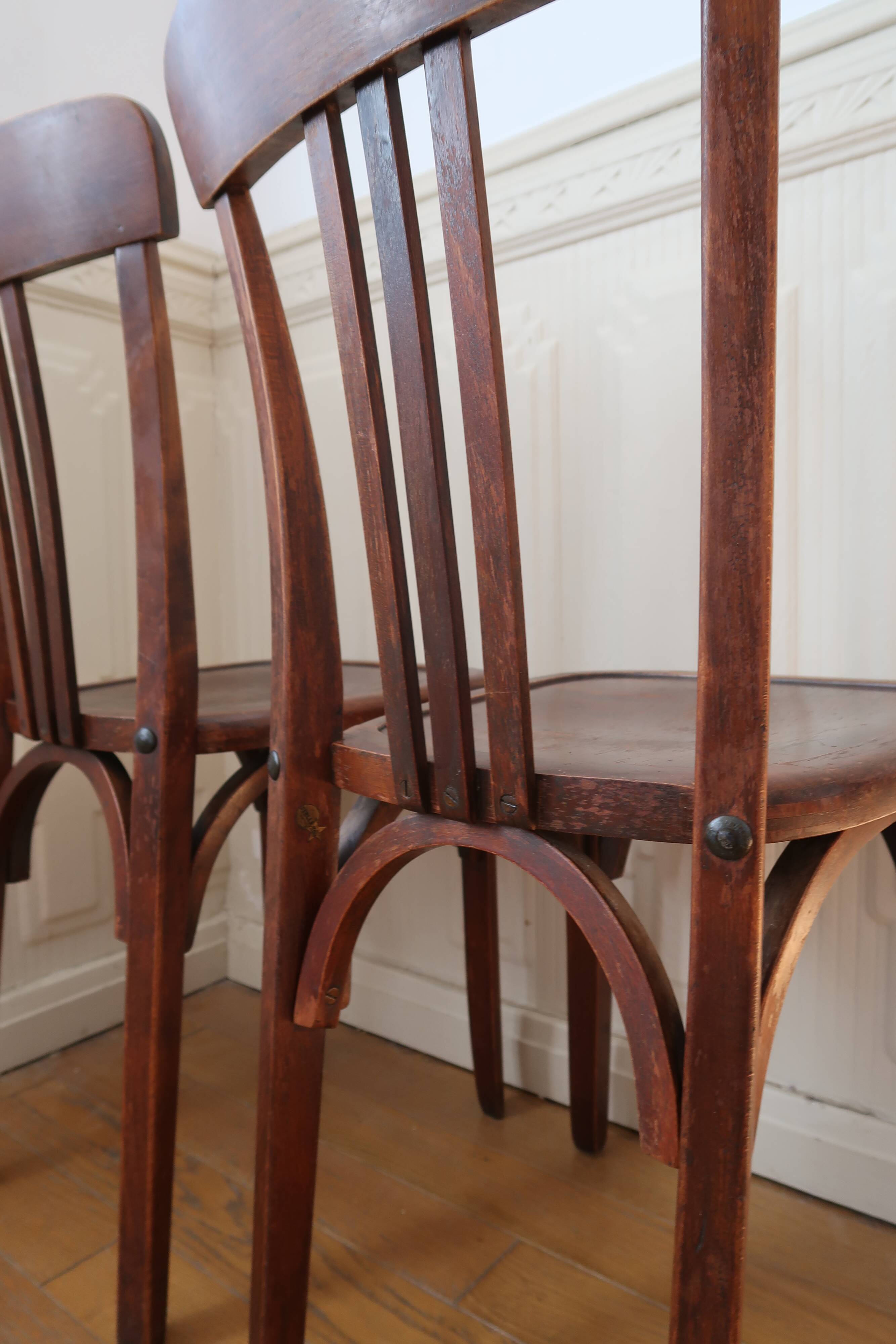 Pair of patinated bistro chairs