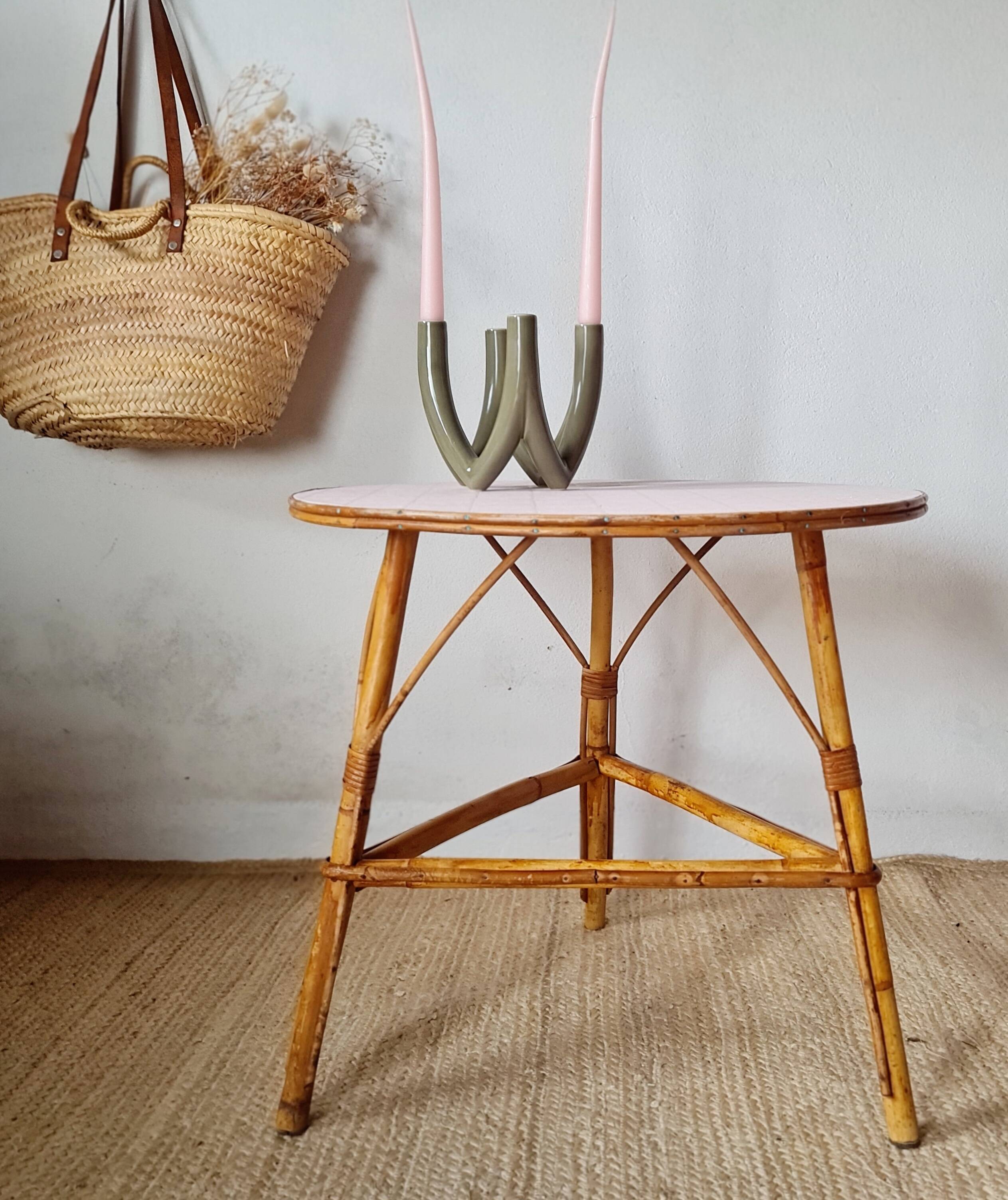 Round soft pink rattan table