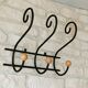 Coat rack/wrought iron hat holder
