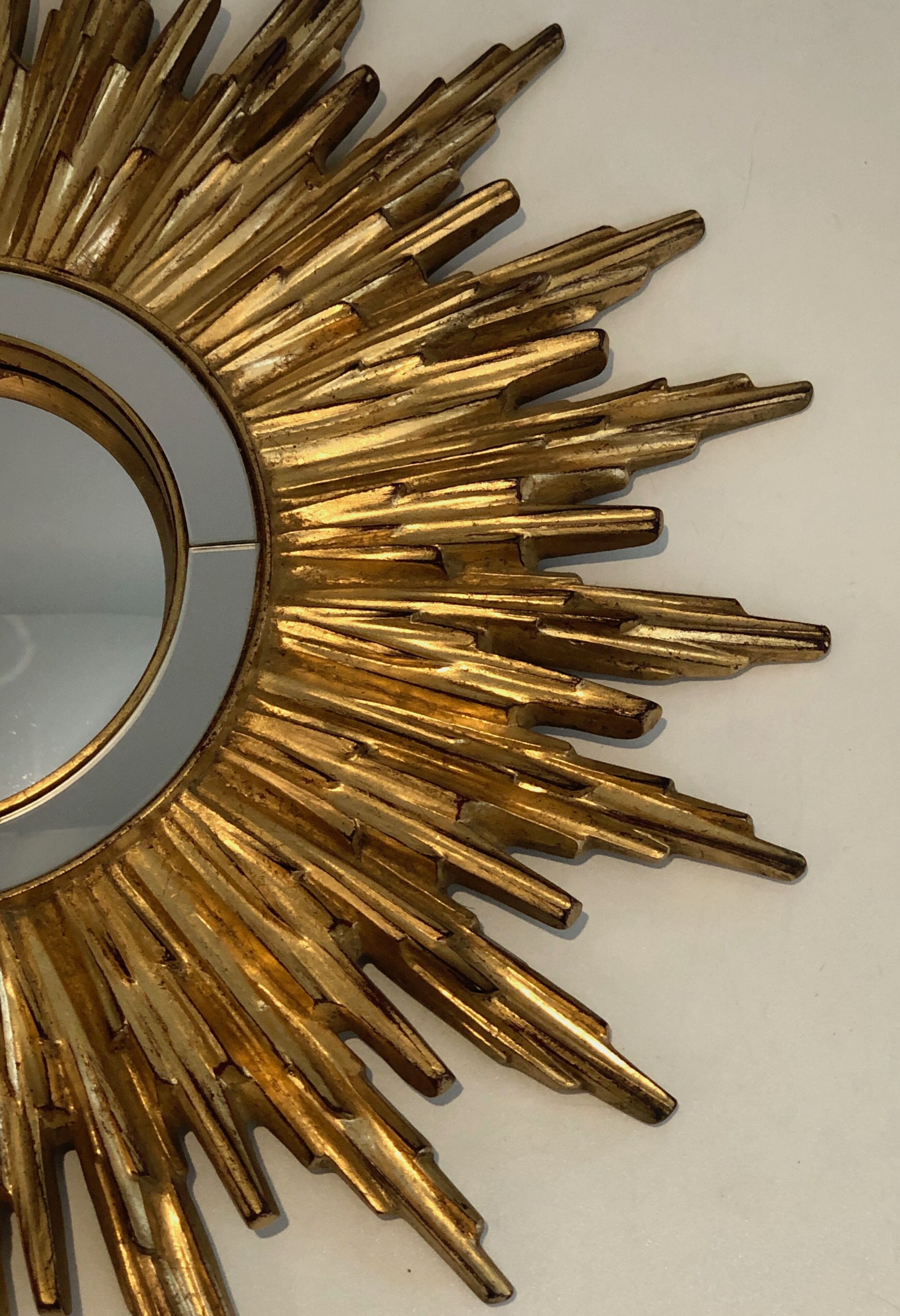 Sun mirror in golden resin 50cm
