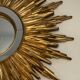 Sun mirror in golden resin 50cm