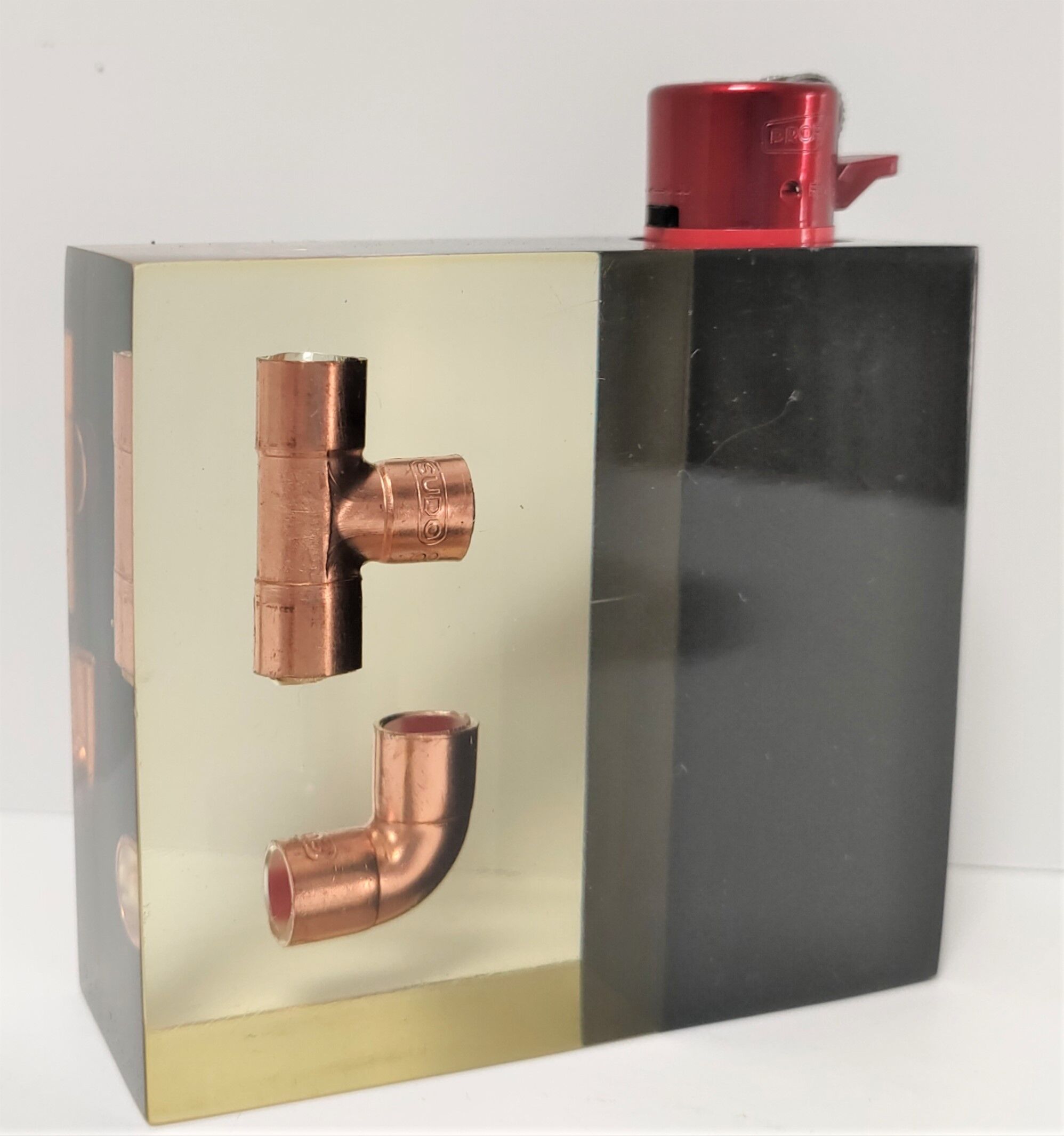 Lighter resin inclusions design 70s