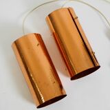 Two 50s tube pendant lamps consisting of two screwed-together copper bowls