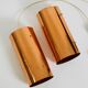 Two 50s tube pendant lamps consisting of two screwed-together copper bowls