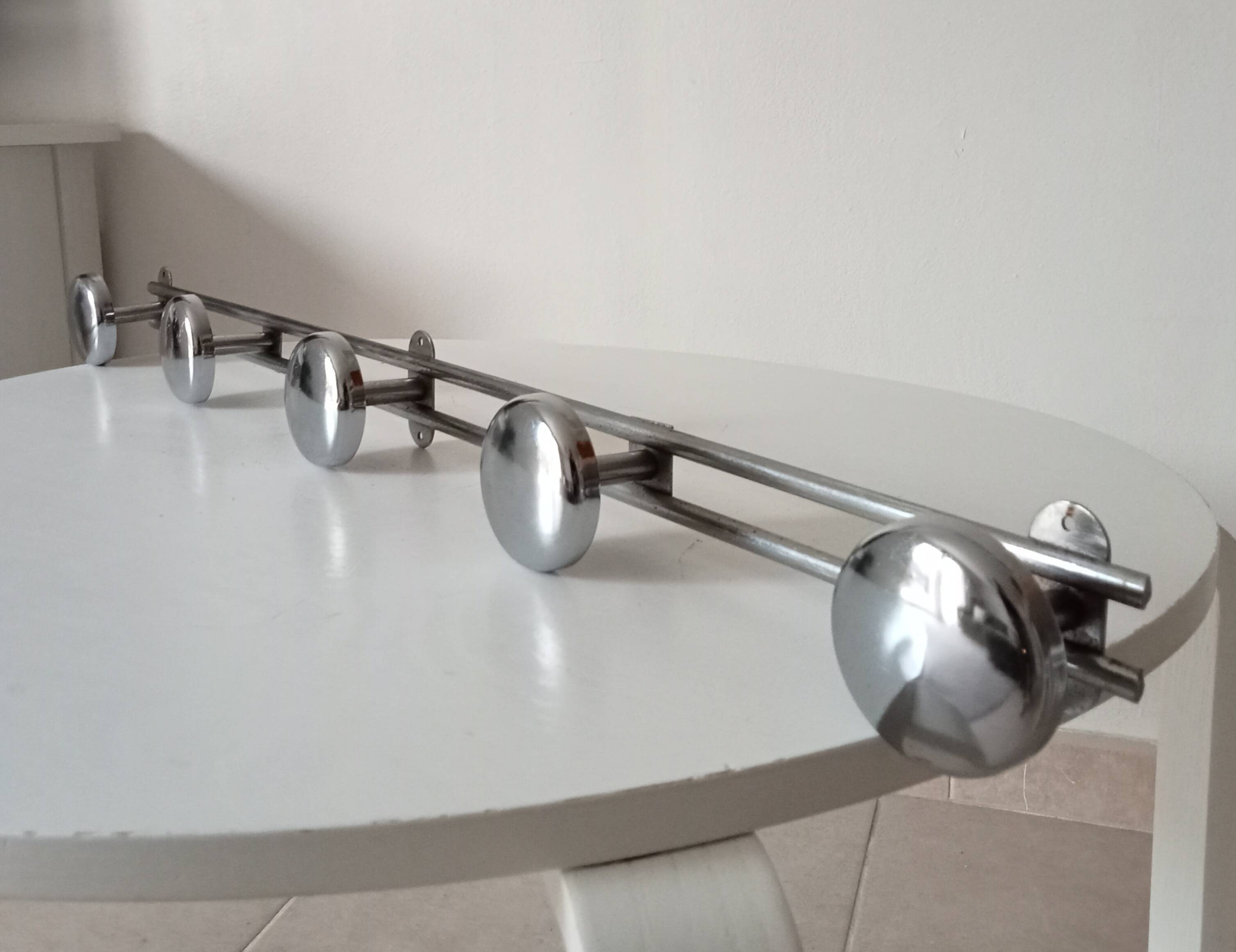 Vintage chrome wall-mounted coat rack from the 1970s