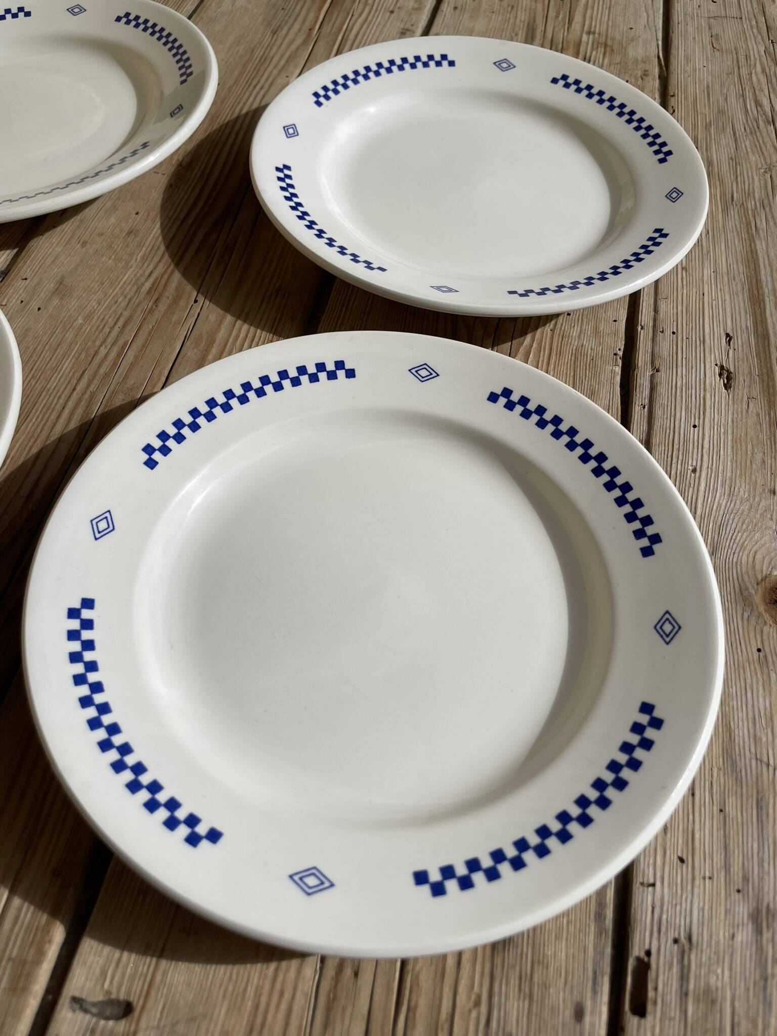 Set of 4 small vintage plates