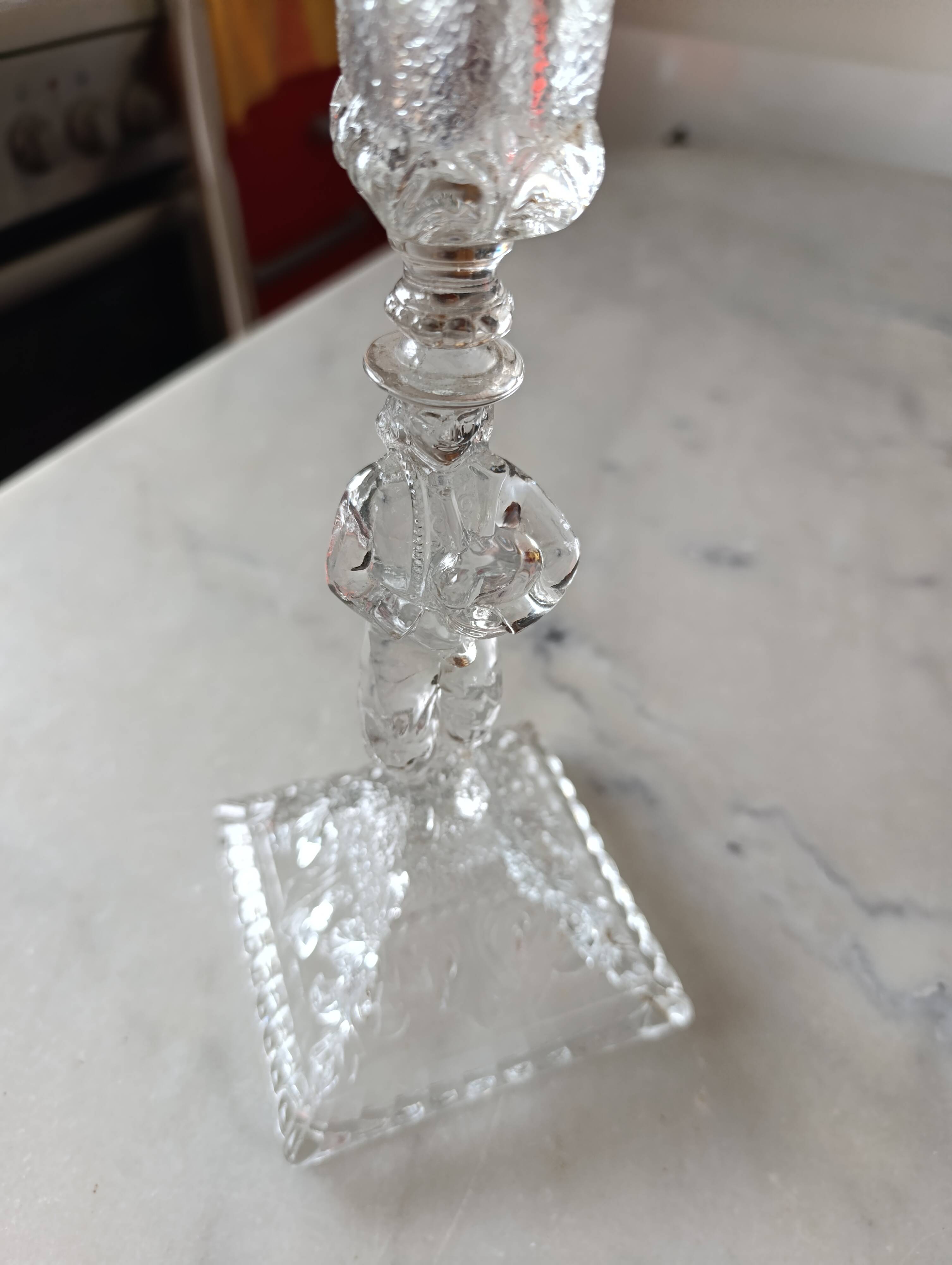 Moulded glass candlestick portieux