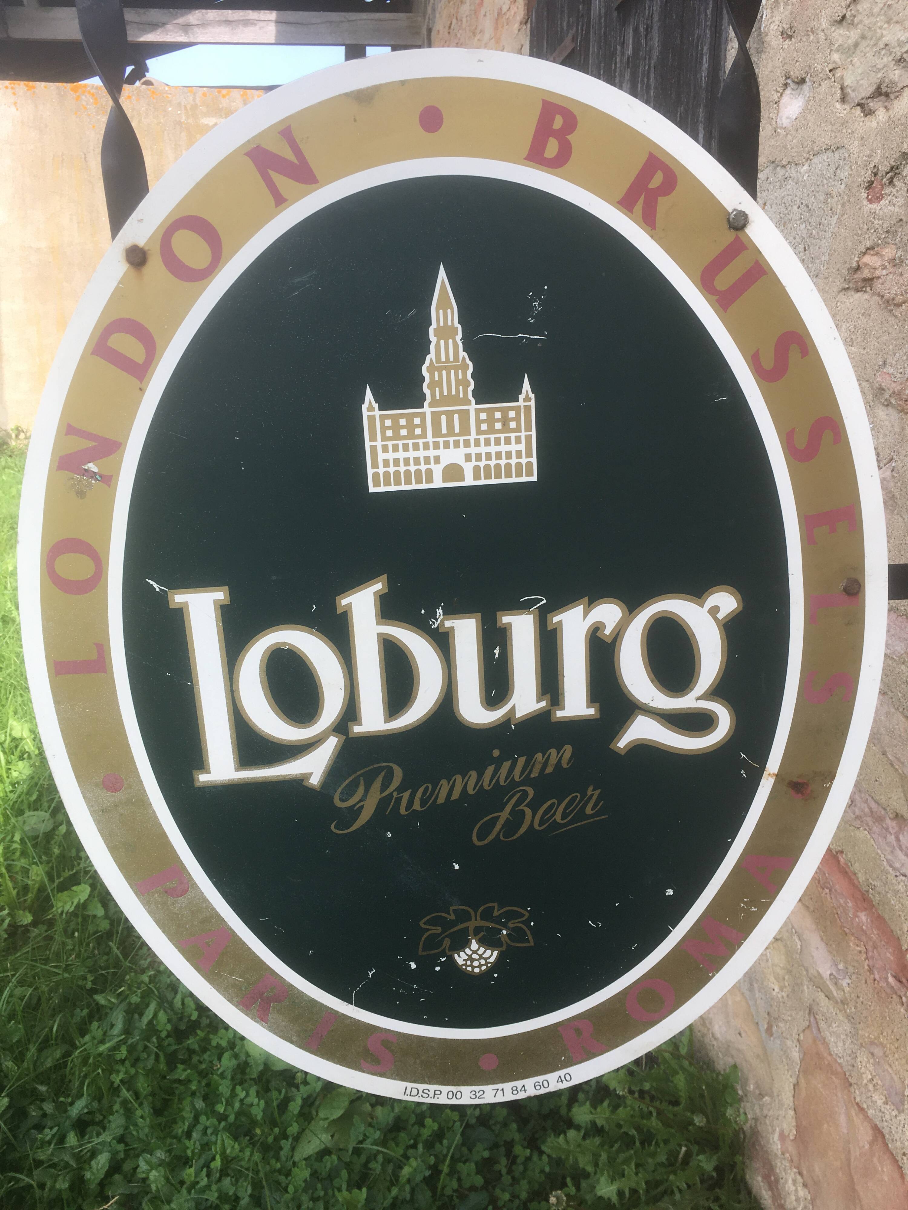 Double-sided "Loburg Beer" metal sign on wrought iron bracket