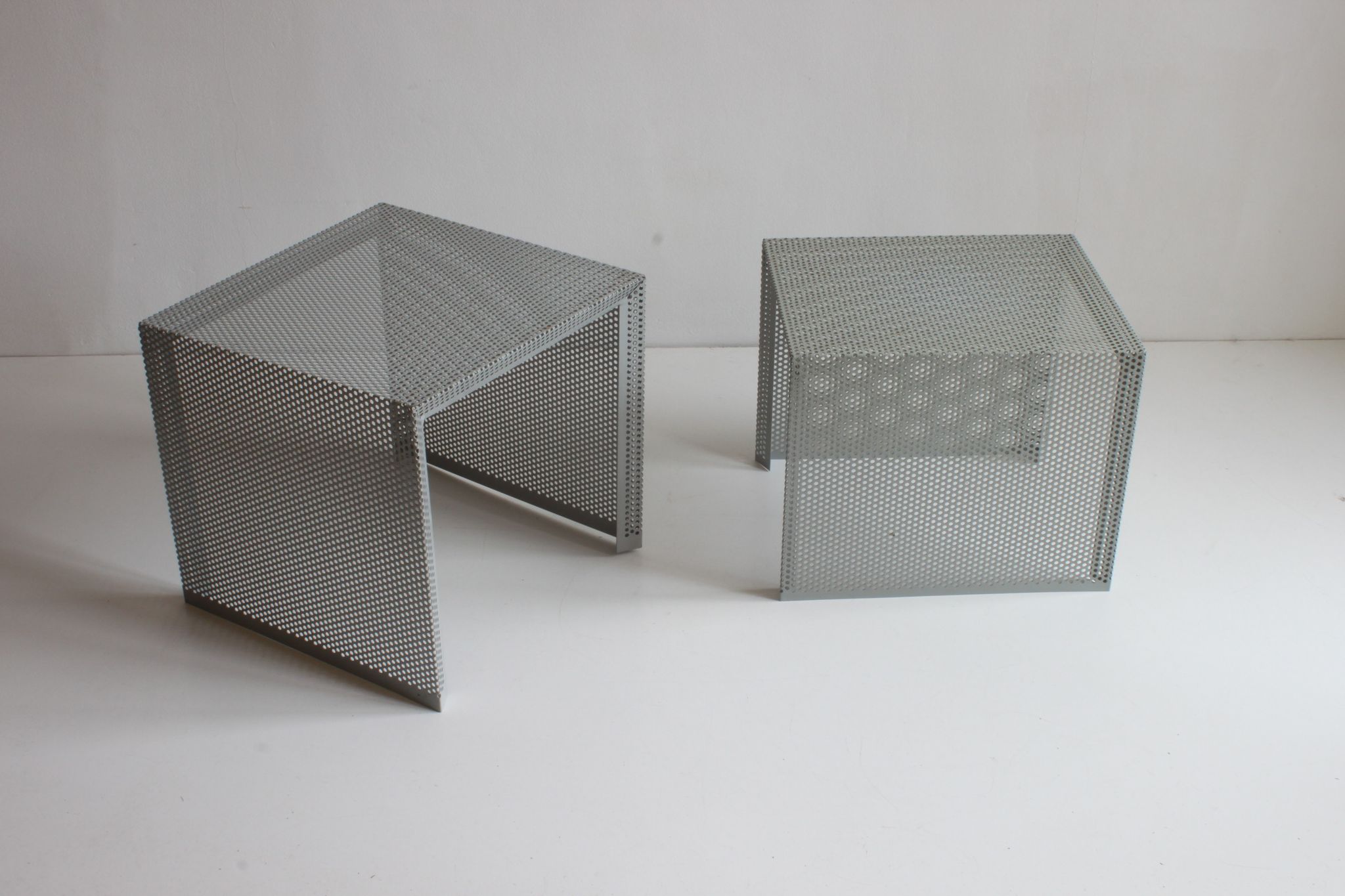 Grey perforated metal nesting side tables, 1990s set of two.