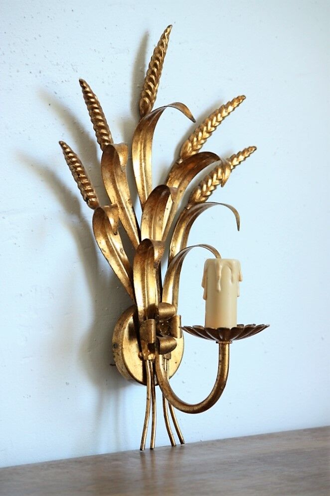 Applies "wheat sheaf" gold metal