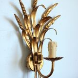 Applies "wheat sheaf" gold metal